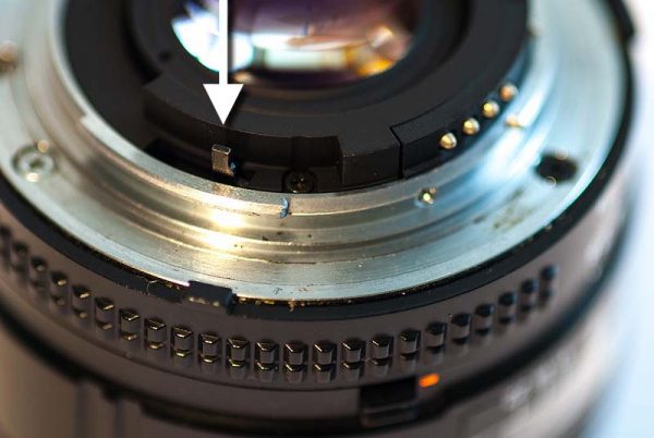 Mechanik zur Übertragung der Blende an einem Nikon-Objektiv. F 22.